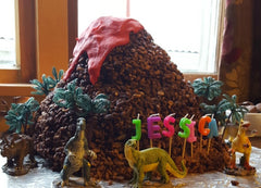 Dinosaur volcano cake