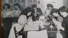 Women repairing hosiery for Whites of Kent