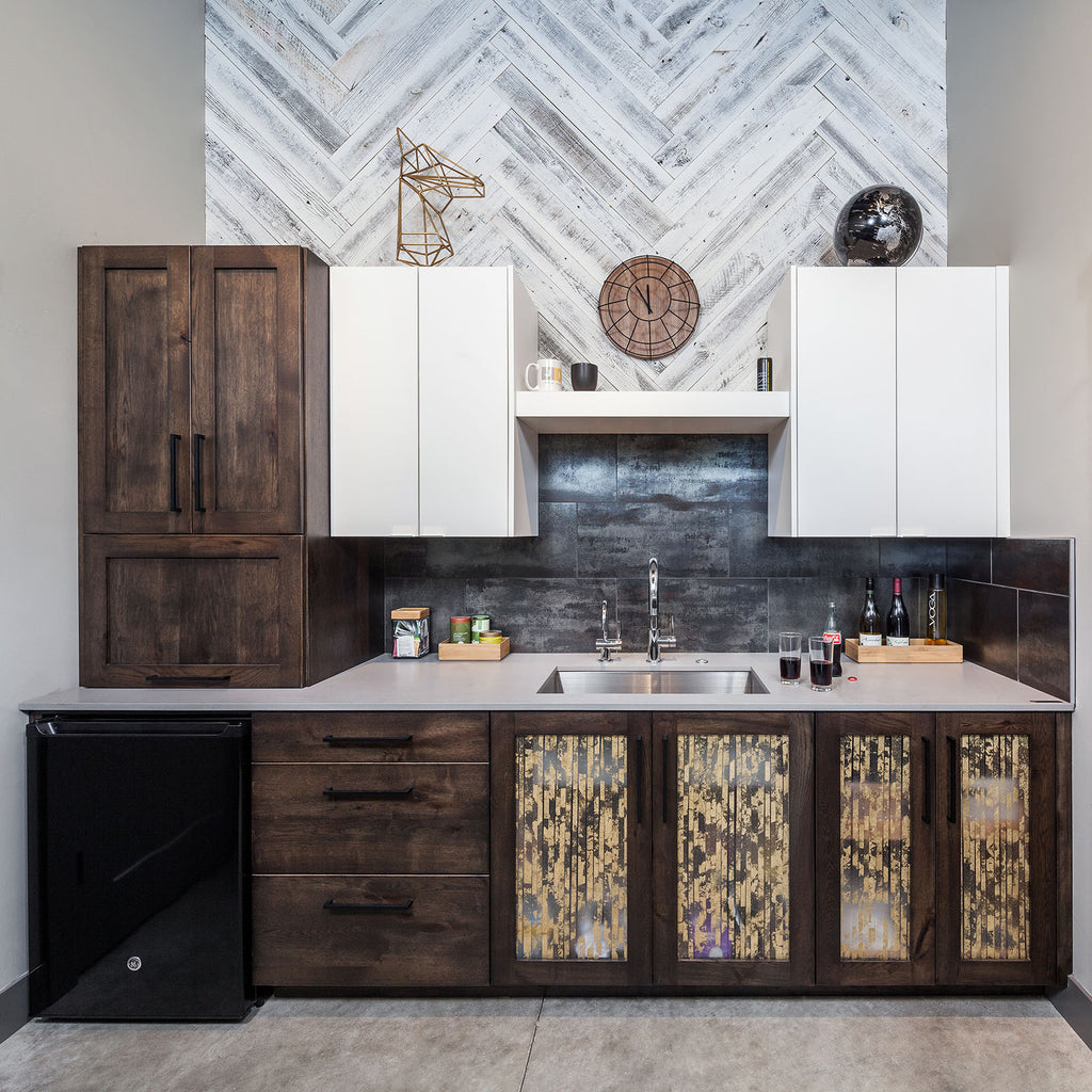 Wood Interior Wall Paneling in a Herringbone Pattern adds character above a wet bar.