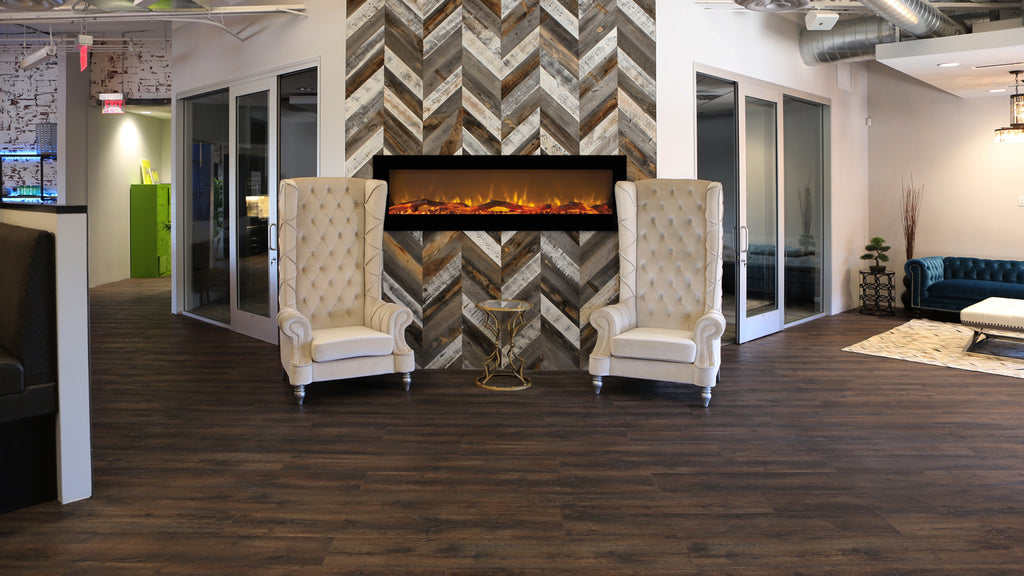 Stikwood interior wall paneling in a chevron pattern around a modern fireplace.