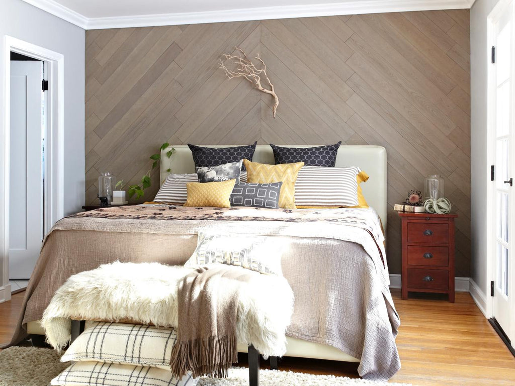Soft Sand wood interior walls in a chevron pattern adorn this master bedroom.
