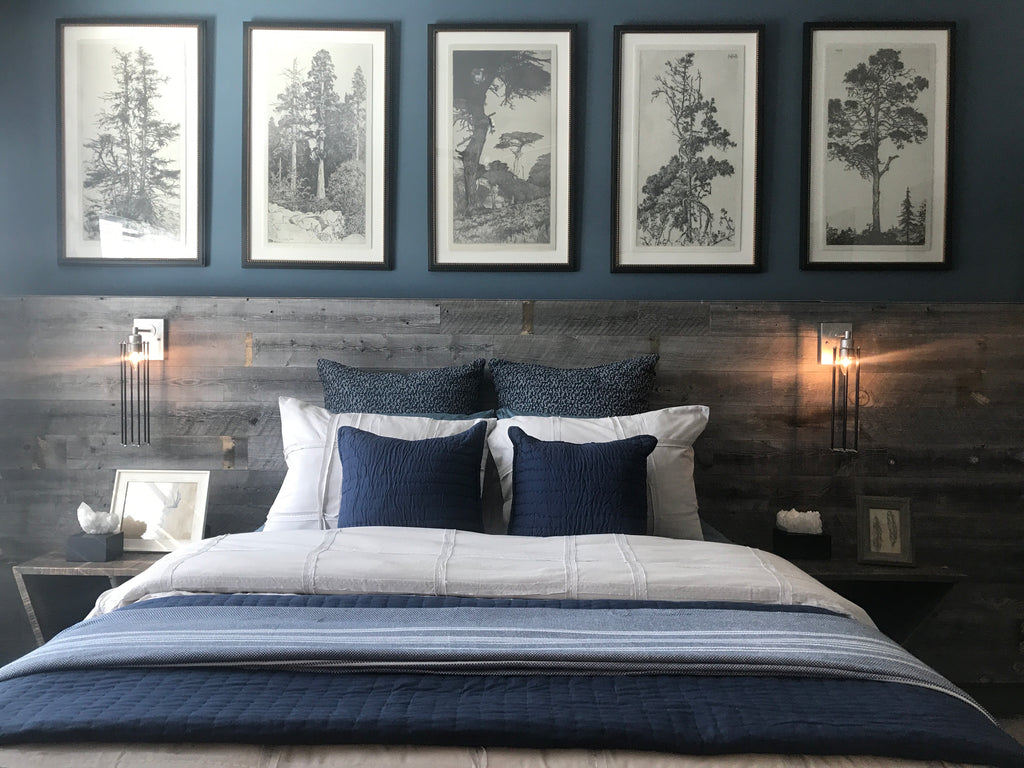 Use Stikwood to make an impact in your bedroom design by adding a half wall of our weathered reclaimed wood planks.