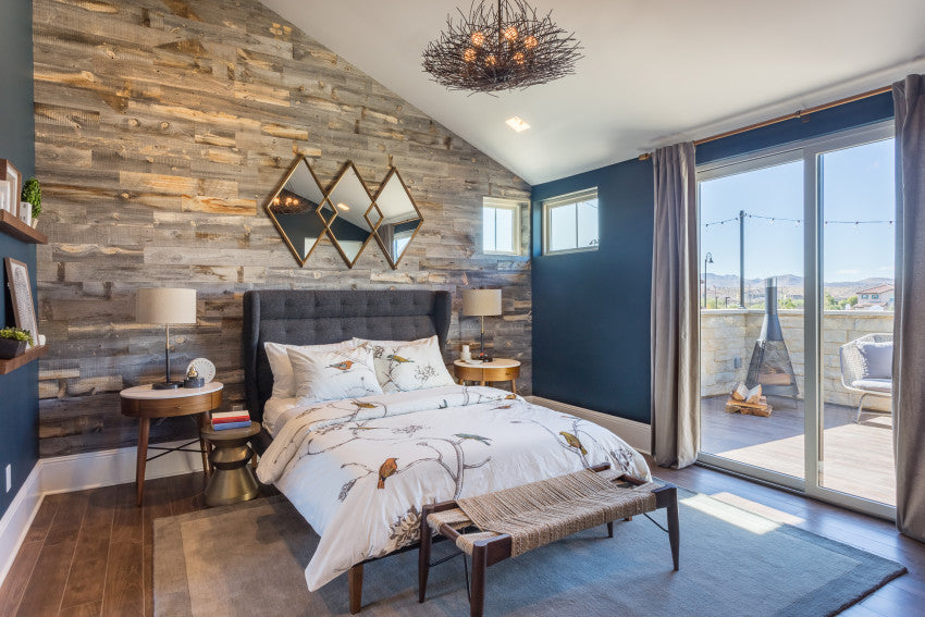 Reclaimed Weathered Wood adds warmth in a way that only reclaimed wood can in this turquoise bedroom.