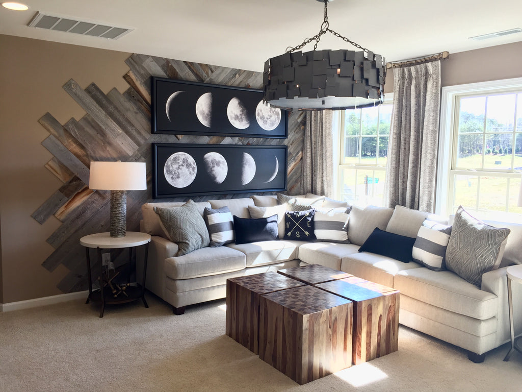 Reclaimed wood paneling by Stikwood has been done in an abstract design in this artsy but masculine family room.