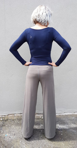 Girl wearing Belinda Ballet in Navy, with Carmen Long pants in Charcoal