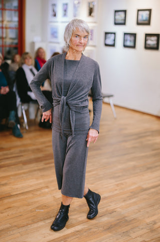 Modular, sustainable bamboo clothing in grey on an older model
