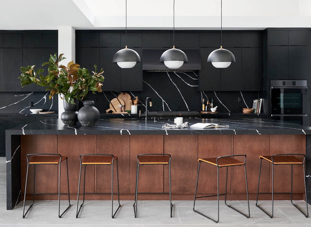 black marble and wood kitchen design