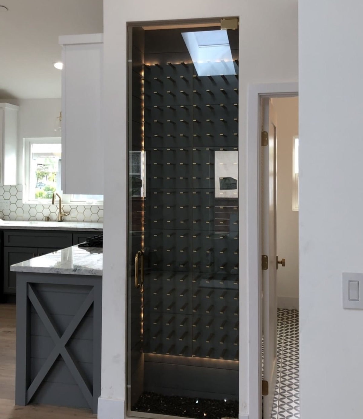 closet wine cellar conversion with glass door