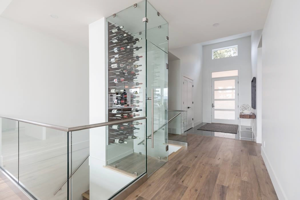 compact glass-enclosed wine cellar