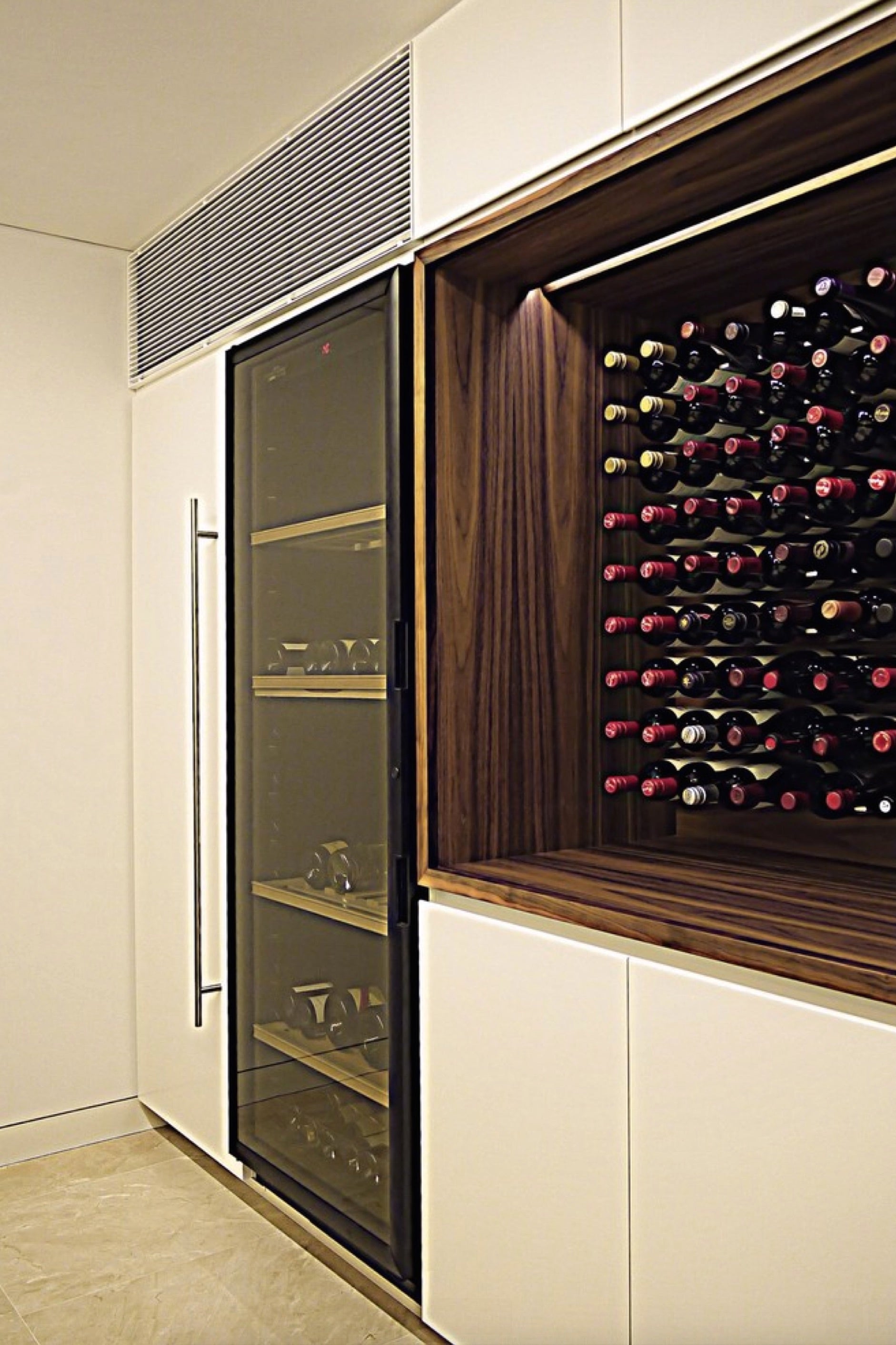custom millwork wood wine cabinet in luxury kitchen
