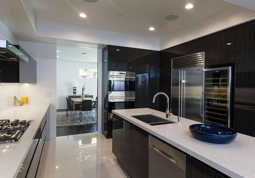 luxury kitchen with wine cellar in hollywood hills home