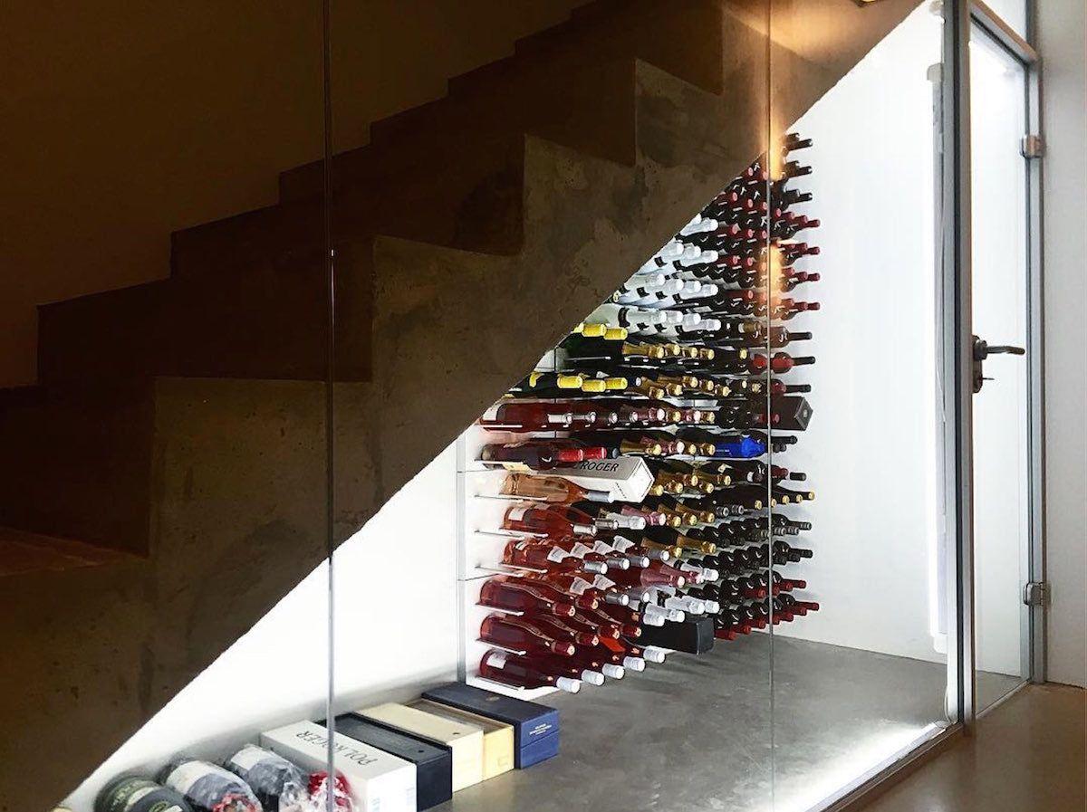 under stairs glass wine cellar concrete villa