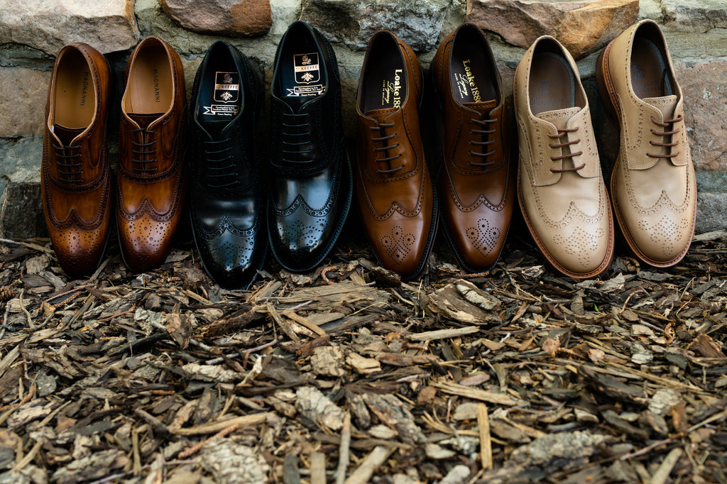 Four pairs of wingtip shoes