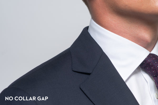 A suit that fits properly and shows no collar gap