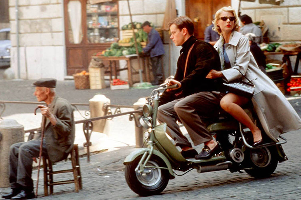 Matt Damon in talented mr ripley on scooter wearing loafers