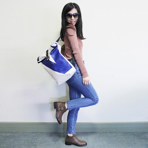 blue and white backpack by m24 bags