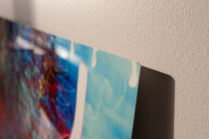 Prints are made on 1mm (1/25") aluminum sheet with 3/16" rounded corners.