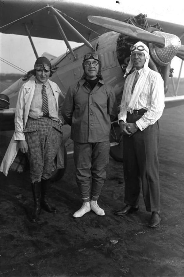 Pilots in Berlin outfitted in their specialized travel gear for aviation.