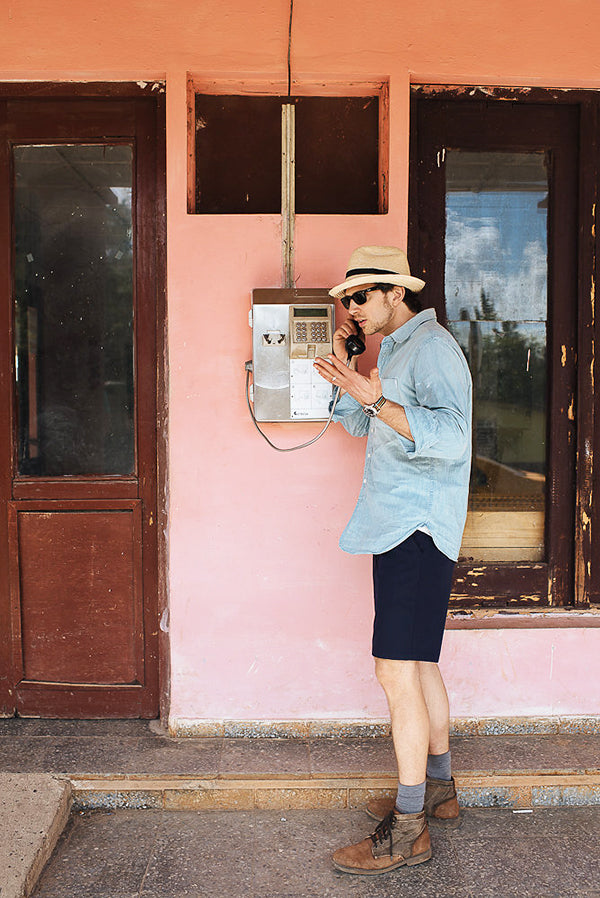 Stefan at a pay phone in Cuba.