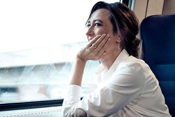 Rachel on the train looking out the window