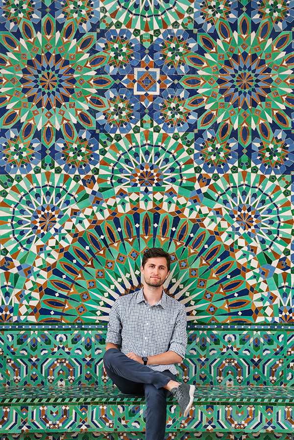  Hassan II Mosque, Casablanca. Resting in the shade outside the second largest mosque in the world decorated with walls of Moroccan tile.