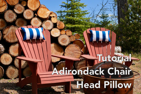Adirondack Chairs in front of logs with neck pillows and tutorial sign