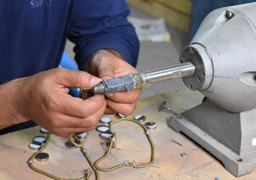 Afghan artisans handcrafting the Kyleigh Necklace