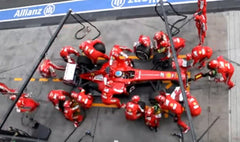 Formula One Ferrari pit stop crew. 