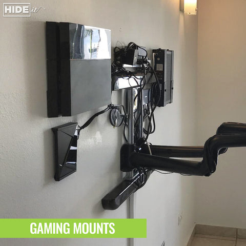 HIDEit Shield TV wall mounted behind wall-mounted TV.