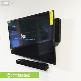 Wall mounted TV with cable box wall mounted using HIDEit Mounts Uni-M mount