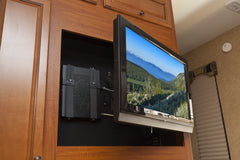 Full motion tv wall mount in rv with HIDEit Cable box wall mount behind