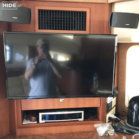 HIDEit Mounts hide it all behind the TV in your RV or yacht.