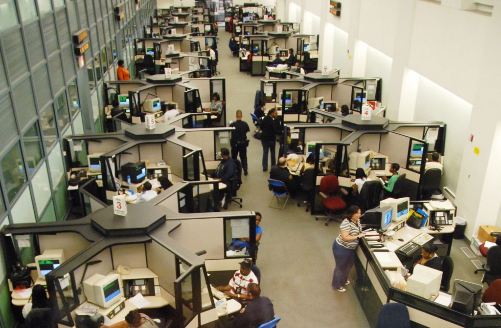 Birdseye view of people working in office cubicles