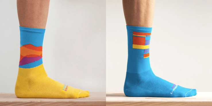 two Ornot socks, blue and yellow on left and blue on right 