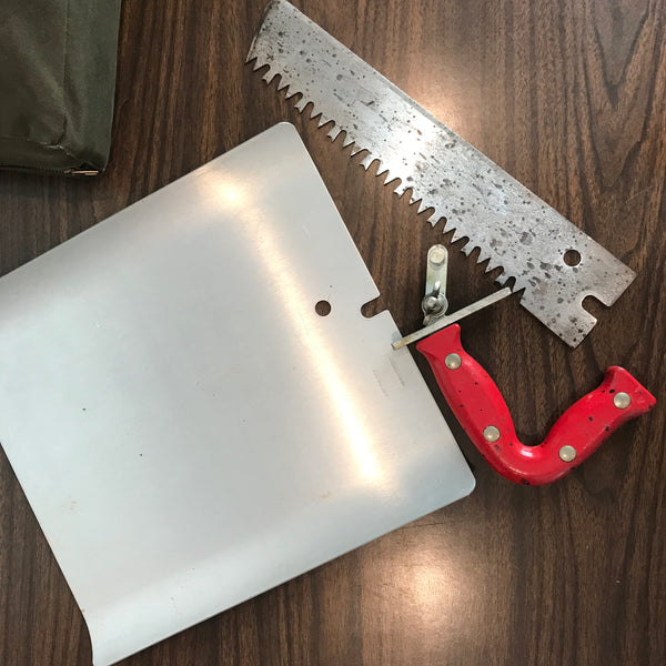 Cold Climate Snow Shovel, Saw, and Knife Combination Tool