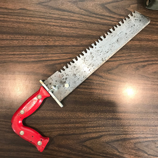 Combination saw and knife with detachable handle.