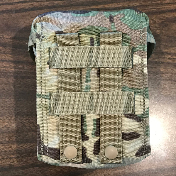 Showing the MOLLE webbing on the back side of the IFAK's Multicam Pouch.