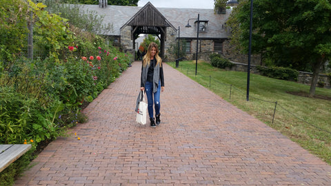 Walking in front of Stone Hill Barns 