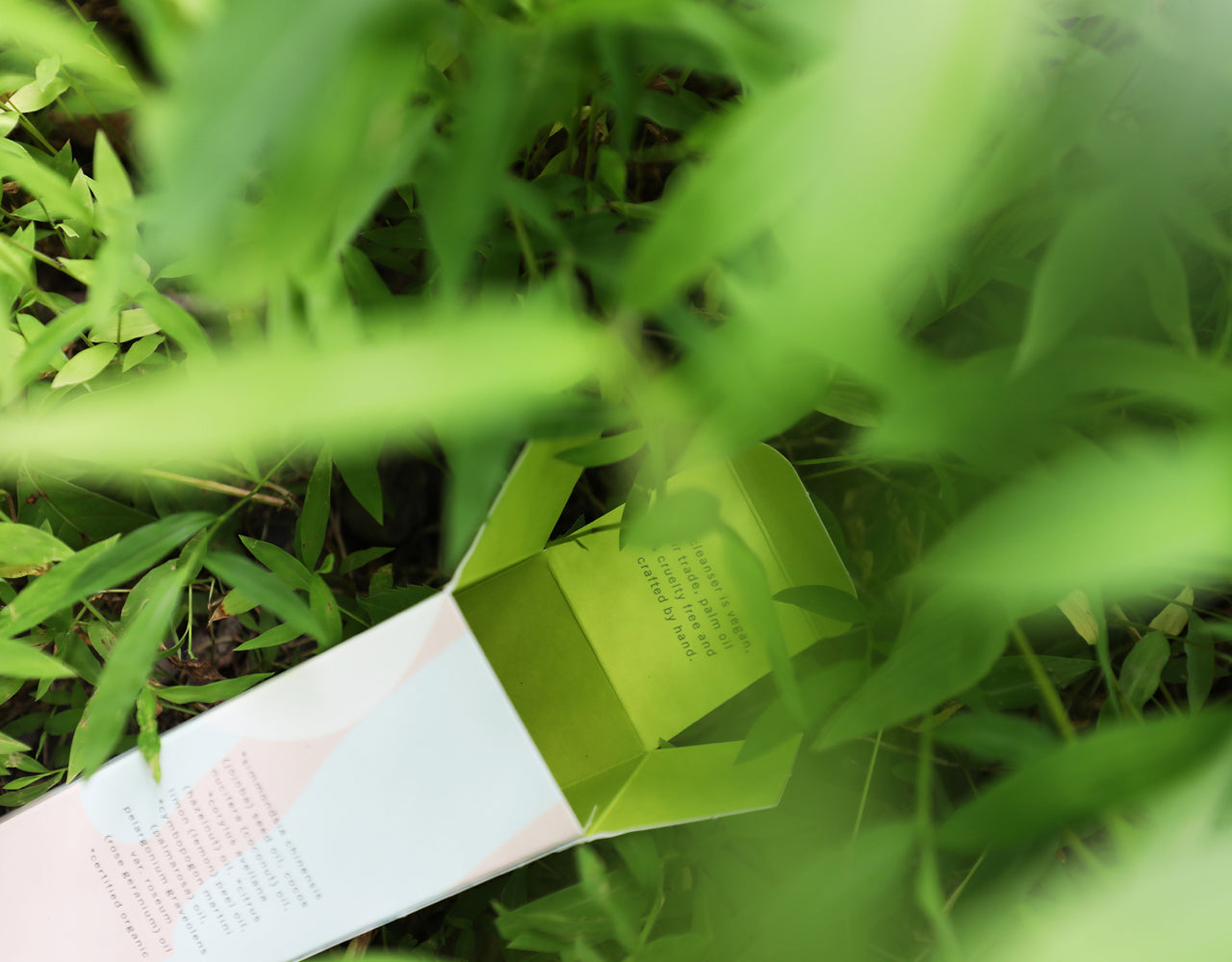 an open product box in the grass
