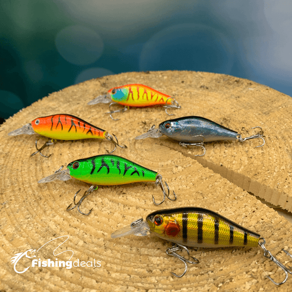 Fishing lures small crankbaits in five colors color presented on piece of wood