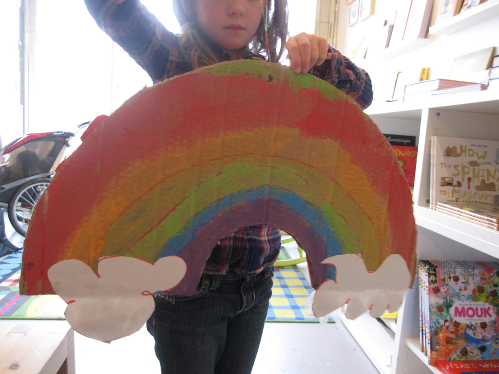 kids making a rainbow paper craft at collage collage