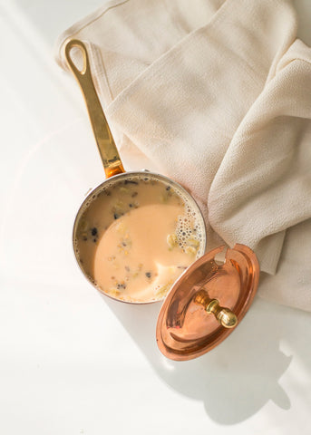 masala chai tea in copper pot