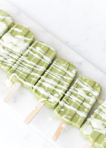 organic matcha Popsicles drizzled with white chocolate