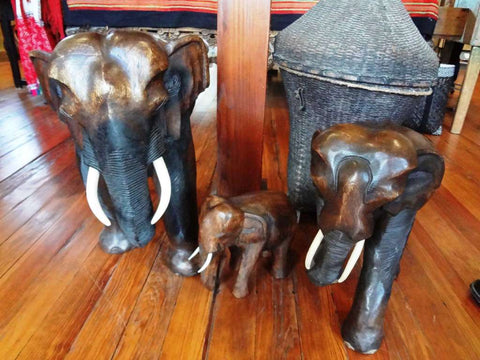 Carved elephants and hand woven Asian baskets can be found at the Elephant Story.