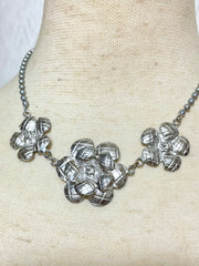 Vintage CHANEL silver matelasse camellia, rose flower charm necklace. Classic Chanel jewelry for your collection. So chic and mod. 0410031