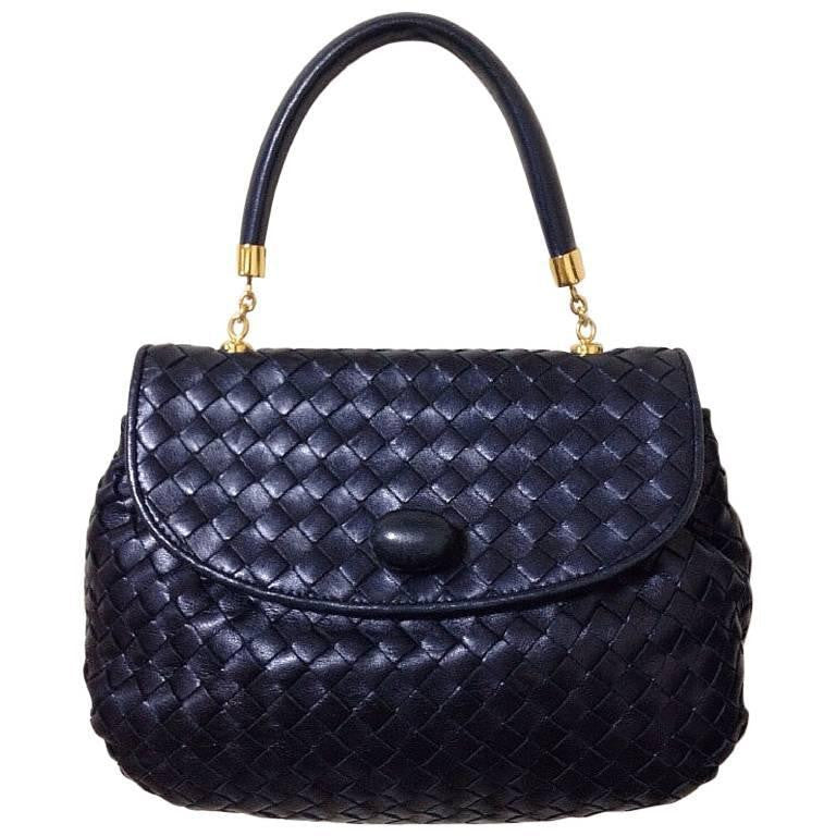 MINT. Vintage Bottega Veneta intrecciato pearl navy woven lambskin handbag. Leather turn-lock closure