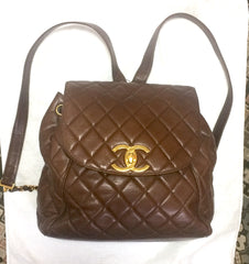 Vintage CHANEL quilted brown lamb leather backpack with gold chain strap and large CC closure. Classic and popular bag. Rare masterpice.
