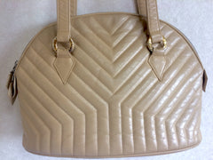 Vintage Yves Saint Laurent beige leather tote bag with Y, Chevron stitch in bolide purse shape. Perfect vintage bag from YSL back in the era
