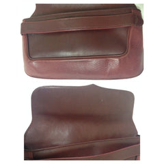 SOLD OUT: Vintage Cartier leather wine color clutch with gold tone charm. must de Cartier Collection