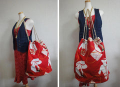 Vintage CHANEL red and white canvas large chain shoulder tote bag with supermodel and 2.55 bag print and CC charm. Mademoiselle print. Must-have collection